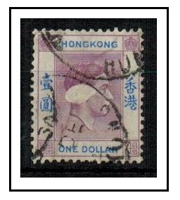 HONG KONG - 1938 $1 dull lilac and blue fine used with spectacular CONFETTI FLAW.  SG 155.