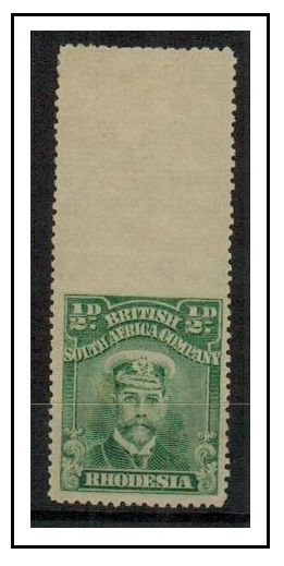 RHODESIA - 1913 1/2d blue green adhesive in a fine mint IMPERFORATE GUTTER marginal example.  SG 202