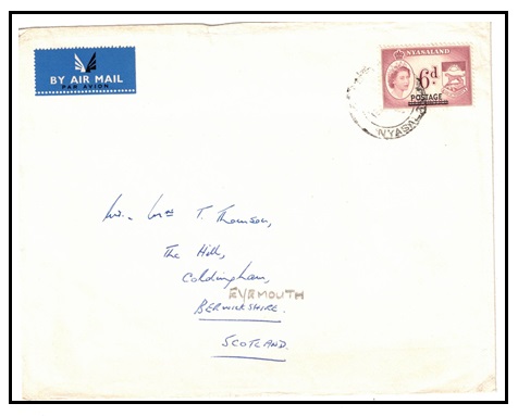 NYASALAND - 1963 6d REVENUE adhesive overprinted POSTAGE on cover to UK.