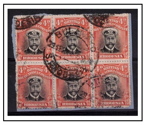 RHODESIA - 1913 4d black and red-orange 